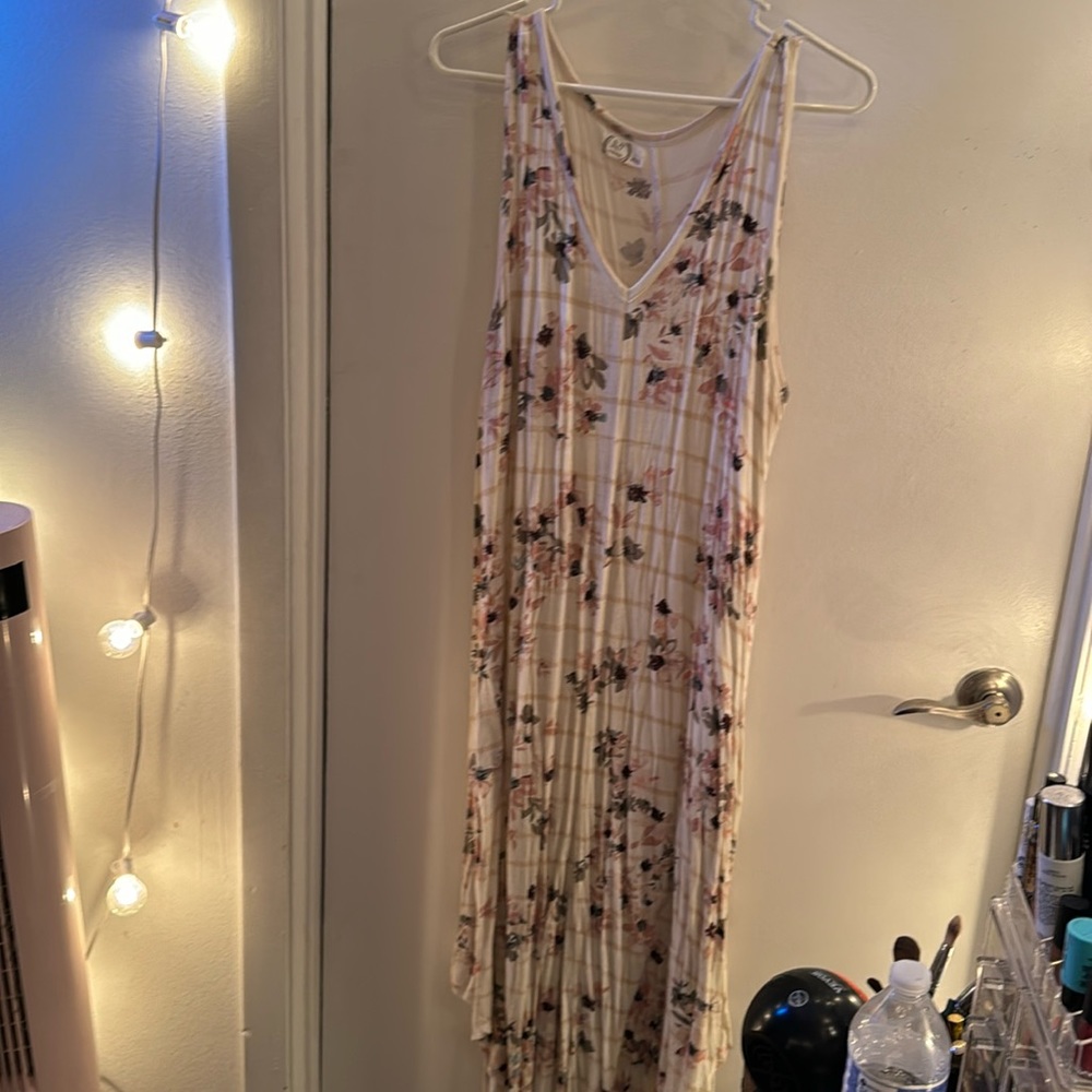 Cream dress with tan stripes and pink/green flowers, comfy and has pockets